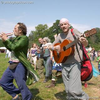 Two musicians lead the Day Out Of Time ritual at the Turaya Gathering 2004. Wimborne, Great Britain. © 2004 Photographicon