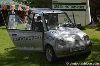 Electric car on show with Going Green at Kingston Green Fair 2004. Kingston Upon Thames, UK. © 2004 Photographicon
