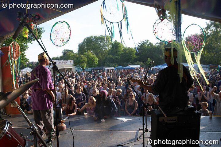 A view of the crowd from the World Music Stage with Gregg Kofi Brown's KGB playing at Kingston Green Fair 2005. Kingston Upon Thames, Great Britain. © 2005 Photographicon