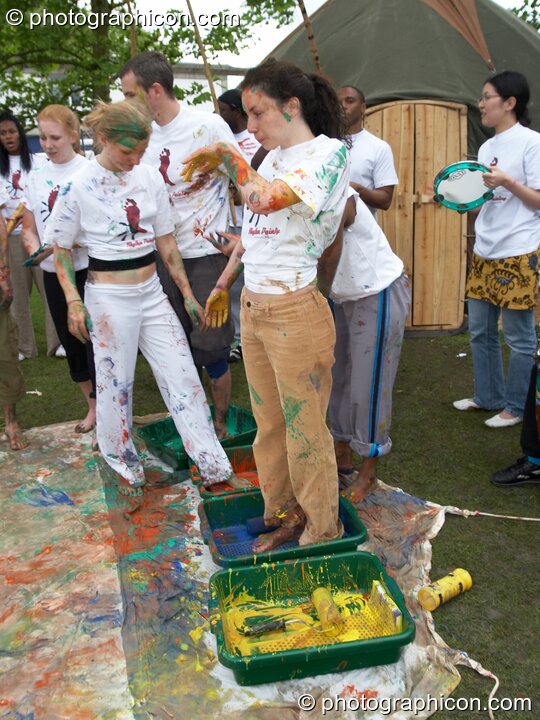 Rhythm Painting get messy with paint while performing Capoeira at Kingston Green Fair 2006. Kingston upon Thames, Great Britain. © 2006 Photographicon