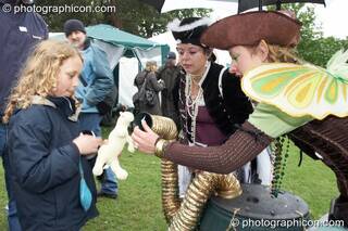 Two woman faires entertain the children at Kingston Green Fair 2007. Kingston upon Thames, Great Britain. © 2007 Photographicon