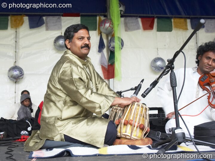 Balasubramaniam perform on the World Stage at Kingston Green Fair 2007. Kingston upon Thames, Great Britain. © 2007 Photographicon