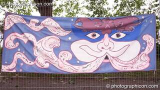 A painted decoration banner wrapped round at Kingston Green Fair 2007. Kingston upon Thames, Great Britain. © 2007 Photographicon