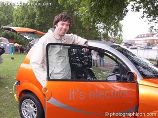 Councillor Rob Lee steps into an electric car at Kingston Green Fair 2007. Kingston upon Thames, Great Britain. © 2007 Photographicon