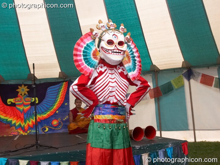 Tibetan monks of Tashi-Lhumpo perform a ritual costumed dance in the Sacred Dance tent at Kingston Green Fair 2007. Kingston upon Thames, Great Britain. © 2007 Photographicon