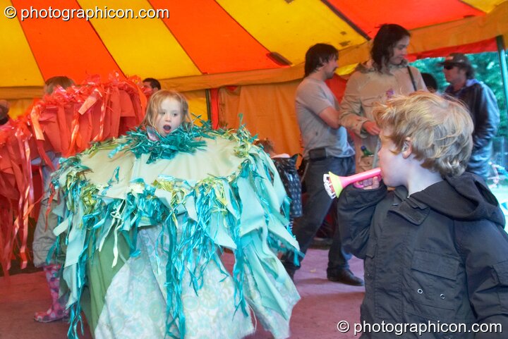 Costumed children dance in the Big Top tent at Kingston Green Fair 2007. Kingston upon Thames, Great Britain. © 2007 Photographicon