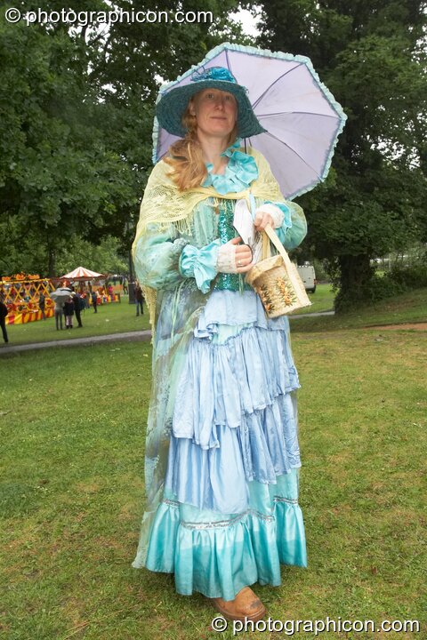 A lady in costumed dress at Kingston Green Fair 2008. Kingston upon Thames, Great Britain. © 2008 Photographicon