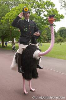 Green Police ride on the back of an emu at the London Green Lifestyle Show 2005. Great Britain. © 2005 Photographicon