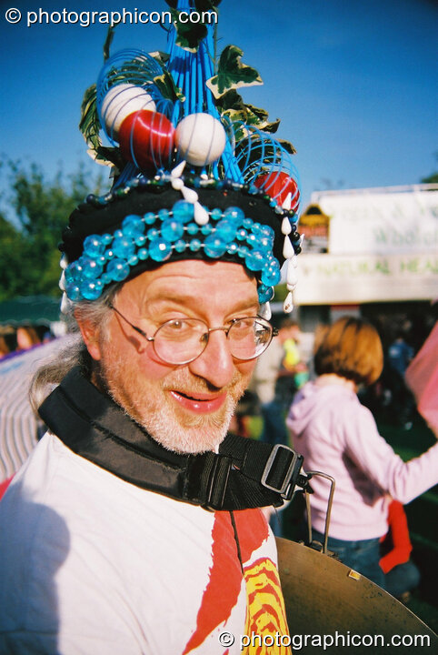 Professor Des Kay, co-founder of Kingston Green Fair, wearing one of his carnival hats. Kingston upon Thames, Great Britain. © 2003 Photographicon