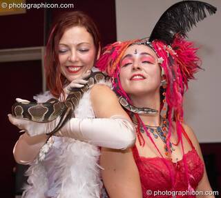 Kwalilox &amp; Sirena dance with Khan at the Save The World Club Burlesque Ball. Kingston upon Thames, Great Britain. © 2005 Photographicon