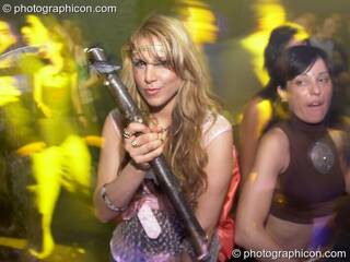 Woman dancing with crystal wand at Echo System. London, Great Britain. © 2006 Photographicon