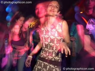 Dancer with flash-ghosted second head in the Psychedelic Rollercoaster Room at Chrysalid. London, Great Britain. © 2006 Photographicon
