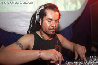 Carlos Santan DJing in the Psychedelic Rollercoaster Room at Chrysalid. London, Great Britain. © 2006 Photographicon