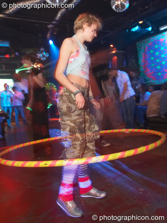 A woman twirls her Hula Hoop at the Liquid Records party. London, Great Britain. © 2007 Photographicon