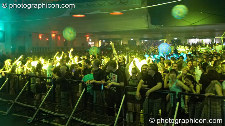 Dancers bounce large balloons around the Main Room at the Twisted Records concert. London, Great Britain. © 2007 Photographicon