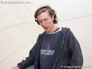 Simon Baring DJs on the Liquid Stage at the Echo Festival. Overton, Great Britain. © 2007 Photographicon