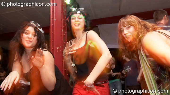 Three women dance at Saharawi, The Synergy Centre. London, Great Britain. © 2007 Photographicon
