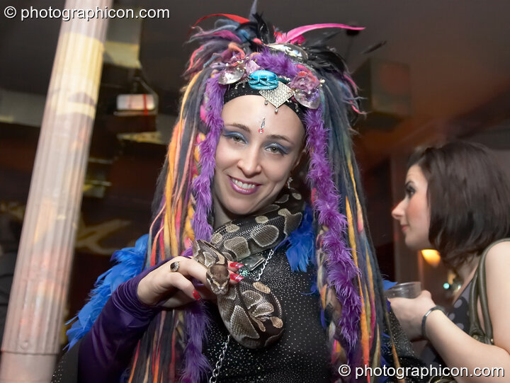 Kwalilox dances with her snake, Khan, at Future Music Vol. 1. London, Great Britain. © 2007 Photographicon