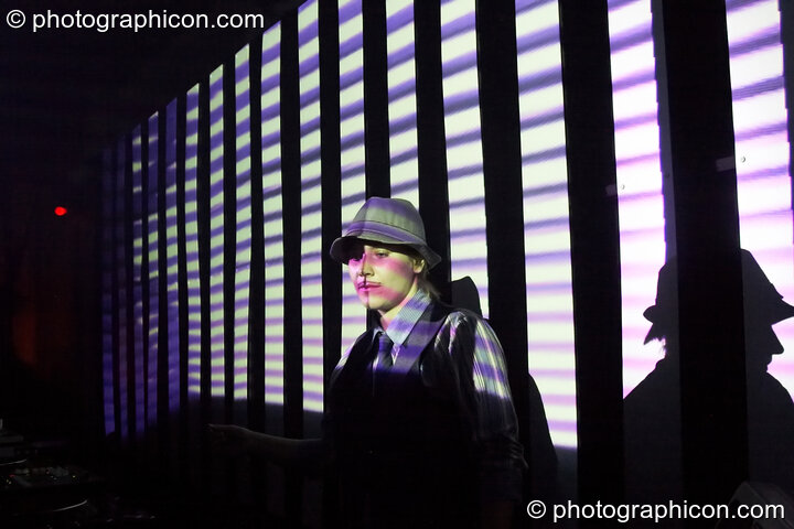 Louise Gandolfi (Chillosophy / IDSpiral, UK) DJ's in front of a video installation by Pixel Addicts featuring bar screen and VJ projections at Dave Green's birthday party. London, Great Britain. © 2007 Photographicon