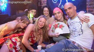 A group of friends in the Dakini Records & Gandalf's Garden Party room at Alpha Omega. London, Great Britain. © 2008 Photographicon