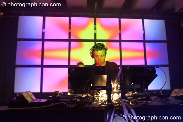 A musician performs in the Future Funk Room with a backdrop pixel-screen visual installation by Inside Solutions at Future Music. London, Great Britain. © 2008 Photographicon