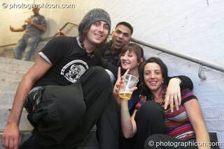 A group of friends chill on the stairs at Future Music. London, Great Britain. © 2008 Photographicon