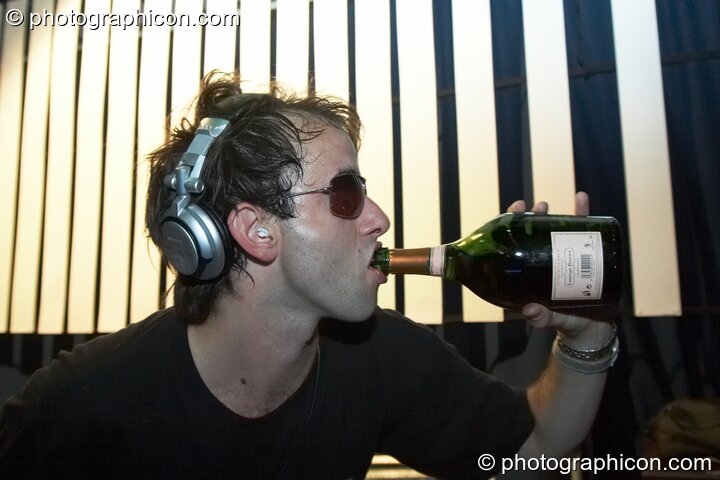 Atomic Drop (Liquid Records) drink champagne while performing in the Future Funk Room at Future Music. London, Great Britain. © 2008 Photographicon