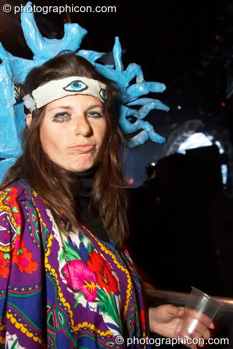 A woman in costume wearing a Shpongle mask at Shpongle Live in Concert. London, Great Britain. © 2008 Photographicon