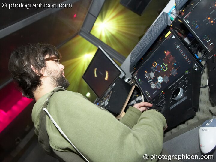 Mark Calvert operates The Pixel Addicts Server and touch-screen controller at Fabric's Matter nightclub. London, Great Britain. © 2008 Photographicon