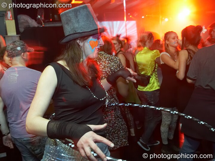 A woman spins an illuminated hoopa hoop at Electric Circus / Circus2Gaza. London, Great Britain. © 2009 Photographicon