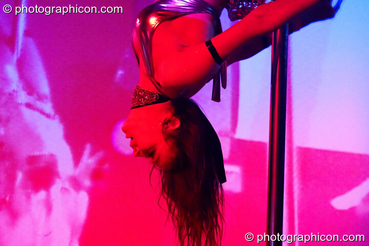 Terri Hosford of Fluorotrash performs psychedelic pole dancing on the Skandalous! stage at Electric Circus / Circus2Gaza. London, Great Britain. © 2009 Photographicon