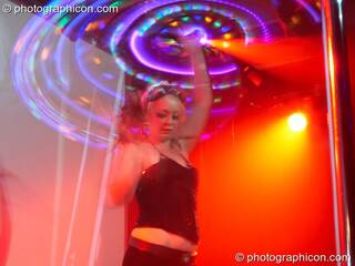 A woman spins an illuminated hoopa hoop at Electric Circus / Circus2Gaza. London, Great Britain. © 2009 Photographicon