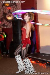 A woman spins an illuminated hoopa hoop at Electric Circus / Circus2Gaza. London, Great Britain. © 2009 Photographicon