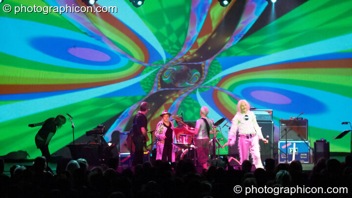 Miquette Giraudy, Steve Hillage, Gilli Smyth, Chris Taylor, Mike Howlett, and Daevid Allen of Planet Gong perform at the Kentish Town Forum with visual projections by ColourSound. London, Great Britain. © 2009 Photographicon