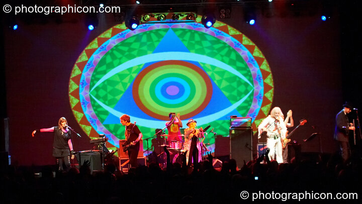 Miquette Giraudy, Steve Hillage, Chris Taylor, Gilli Smyth, Daevid Allen, Mike Howlett, and Theo Travis of Planet Gong perform at the Kentish Town Forum with visual projections by ColourSound. London, Great Britain. © 2009 Photographicon