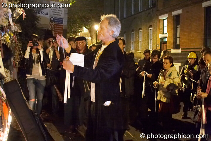 John Constable leads the reading of the names of the outcast dead outside the gates of the old Cross Bones graveyard at The Halloween of the Cross Bones XIII. London, Great Britain. © 2010 Photographicon