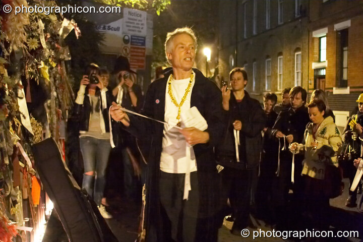 John Constable leads the reading of the names of the outcast dead outside the gates of the old Cross Bones graveyard at The Halloween of the Cross Bones XIII. London, Great Britain. © 2010 Photographicon
