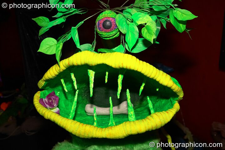 Fluro cyclopse creature  with open gaping mouth in the Art Nation decor at the Synergy Project. London, Great Britain. © 2004 Photographicon