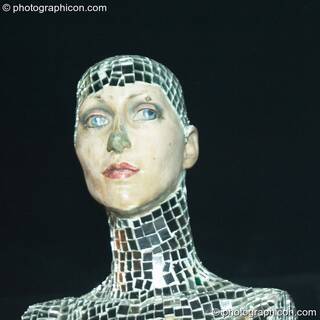 Manequin head covered in small mirror tiles in the Project Ozma space at the Synergy Project. London, Great Britain. © 2004 Photographicon