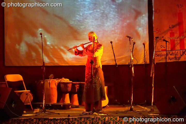 Loan flautist in the The Synergy Centre space at The Synergy Project. London, Great Britain. © 2006 Photographicon