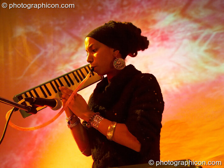 Unnamed melodica player in the Synergy Centre space at The Synergy Project. London, Great Britain. © 2006 Photographicon