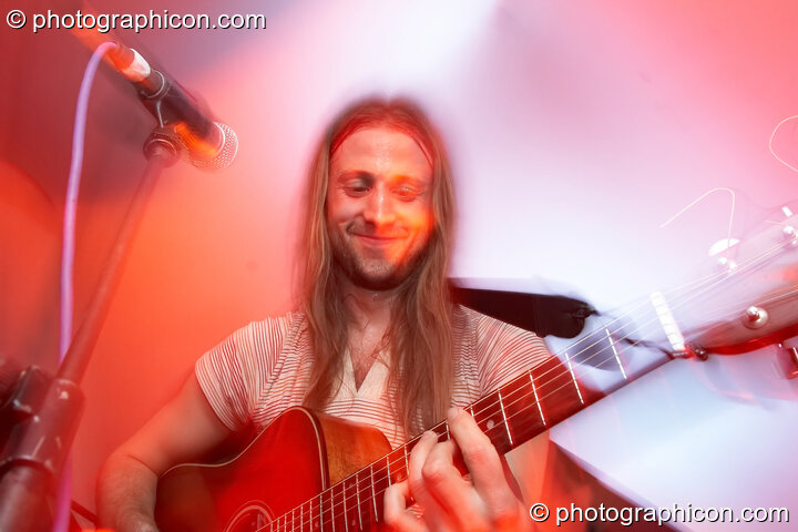 Luke Parker of Martha Tilston and The Woods on the Small World Stage at The Synergy Project. London, Great Britain. © 2006 Photographicon