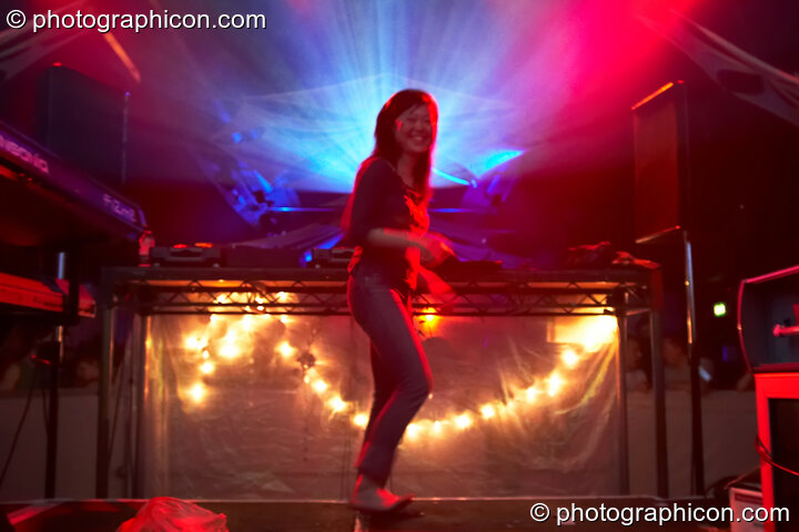 Kana radiates light while DJing in the Liquid Records / Inside-Us-All space at The Synergy Project. London, Great Britain. © 2006 Photographicon