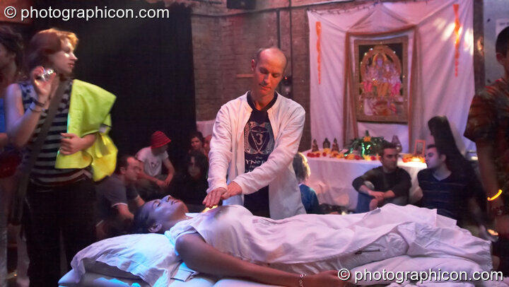 Christian gives an energy massage in the Healing space at The Synergy Project. London, Great Britain. © 2006 Photographicon