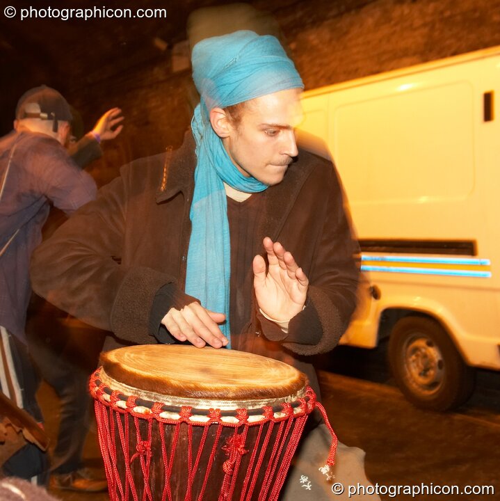 Anthony drums during a Spirit Jamming session in the road tunnel outside The Synergy Project. London, Great Britain. © 2006 Photographicon