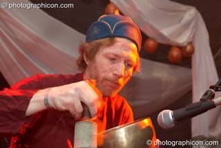 Michael Ormiston performs with a sound bowl on the Silk Road Arts stage at The Synergy Project. London, Great Britain. © 2007 Photographicon