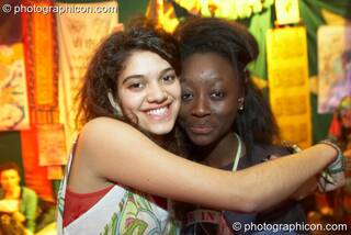 Two women embrace at The Synergy Project. London, Great Britain. © 2007 Photographicon