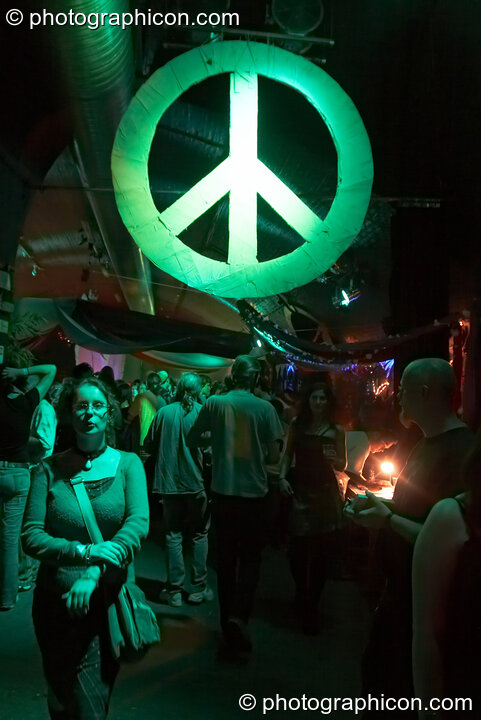 A large CND symbol hangs above the heads of revellers at The Synergy Project. London, Great Britain. © 2007 Photographicon