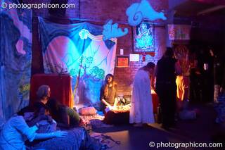 People chill amongst the decor in the Healing Space at The Synergy Project. London, Great Britain. © 2007 Photographicon