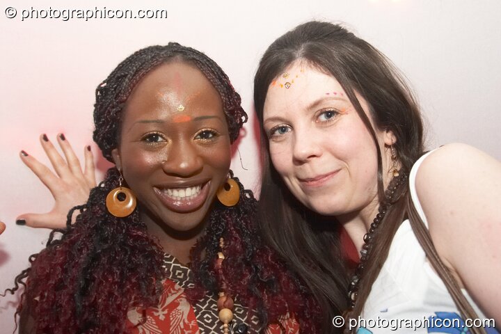 Two women enjoy the party in the Folktronica room at The Synergy Project. London, Great Britain. © 2008 Photographicon